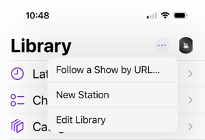 A screenshot of Apple Podcasts library menu exposed by selecting the three dots on the library page.  The option to 'Follow a Show by URL' is available at the top.